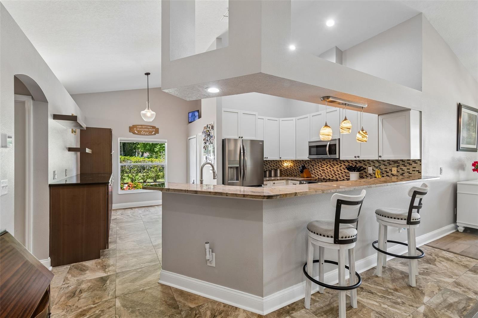 Kitchen with stainless steel appliances & granite countertops!