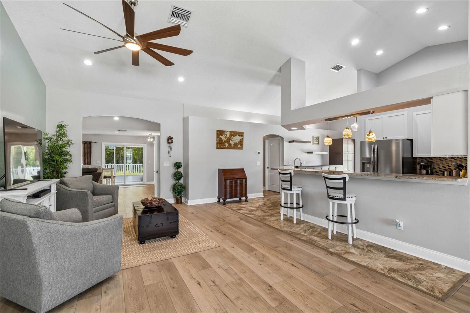 Large living room area with cathedral ceiling!