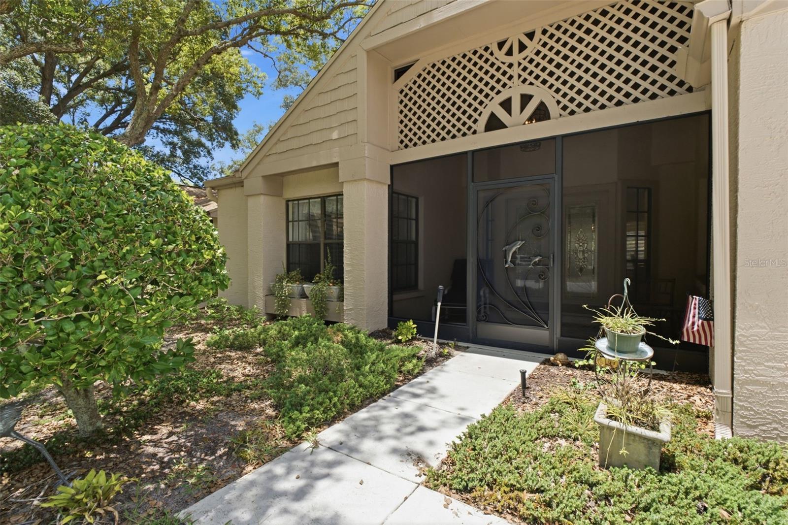 Screened front patio.