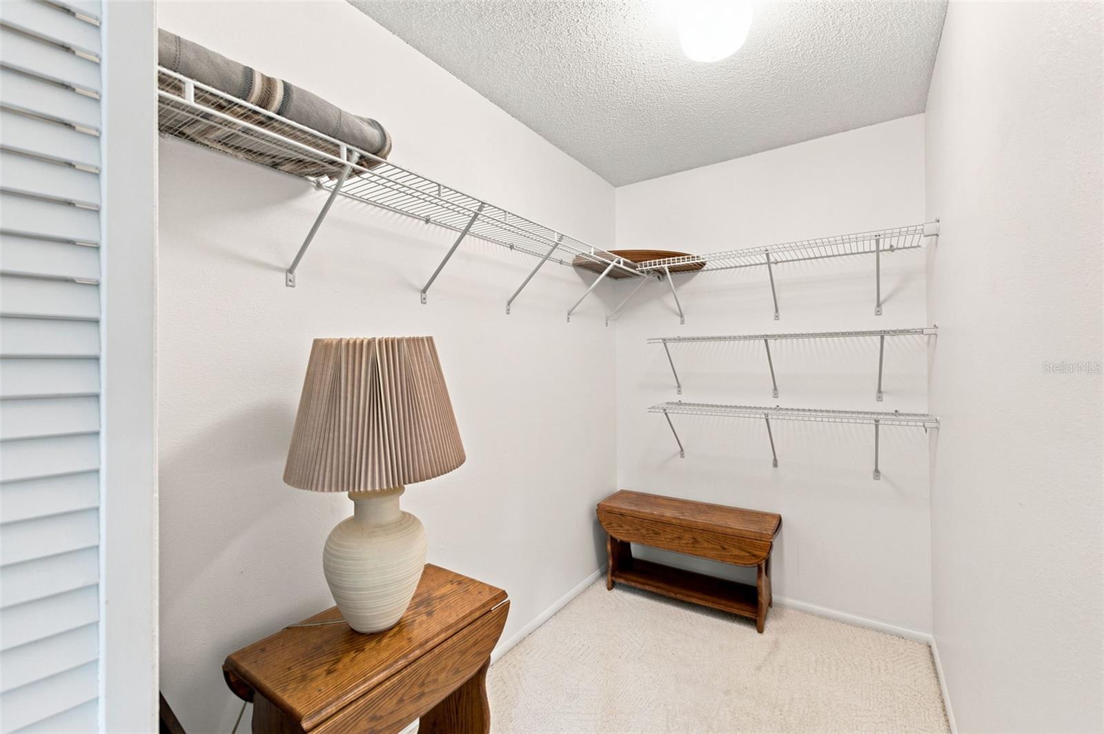 Guest bedroom walk-in closet.