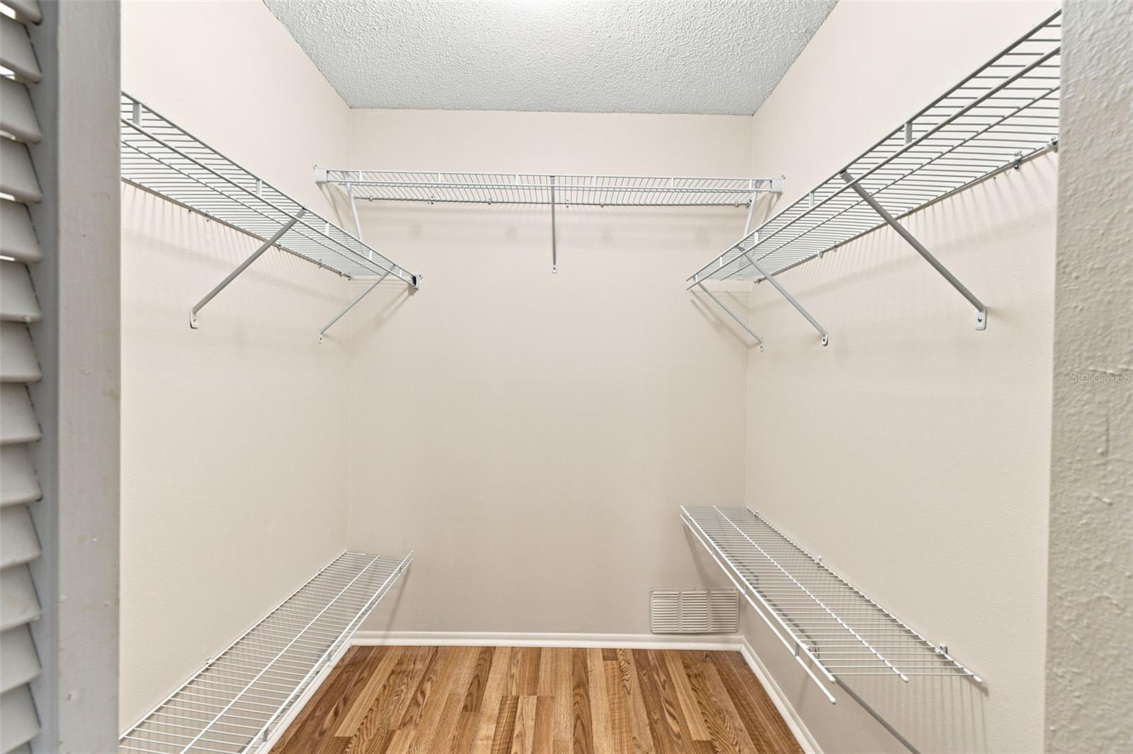 Primary bedroom with walk in closet.