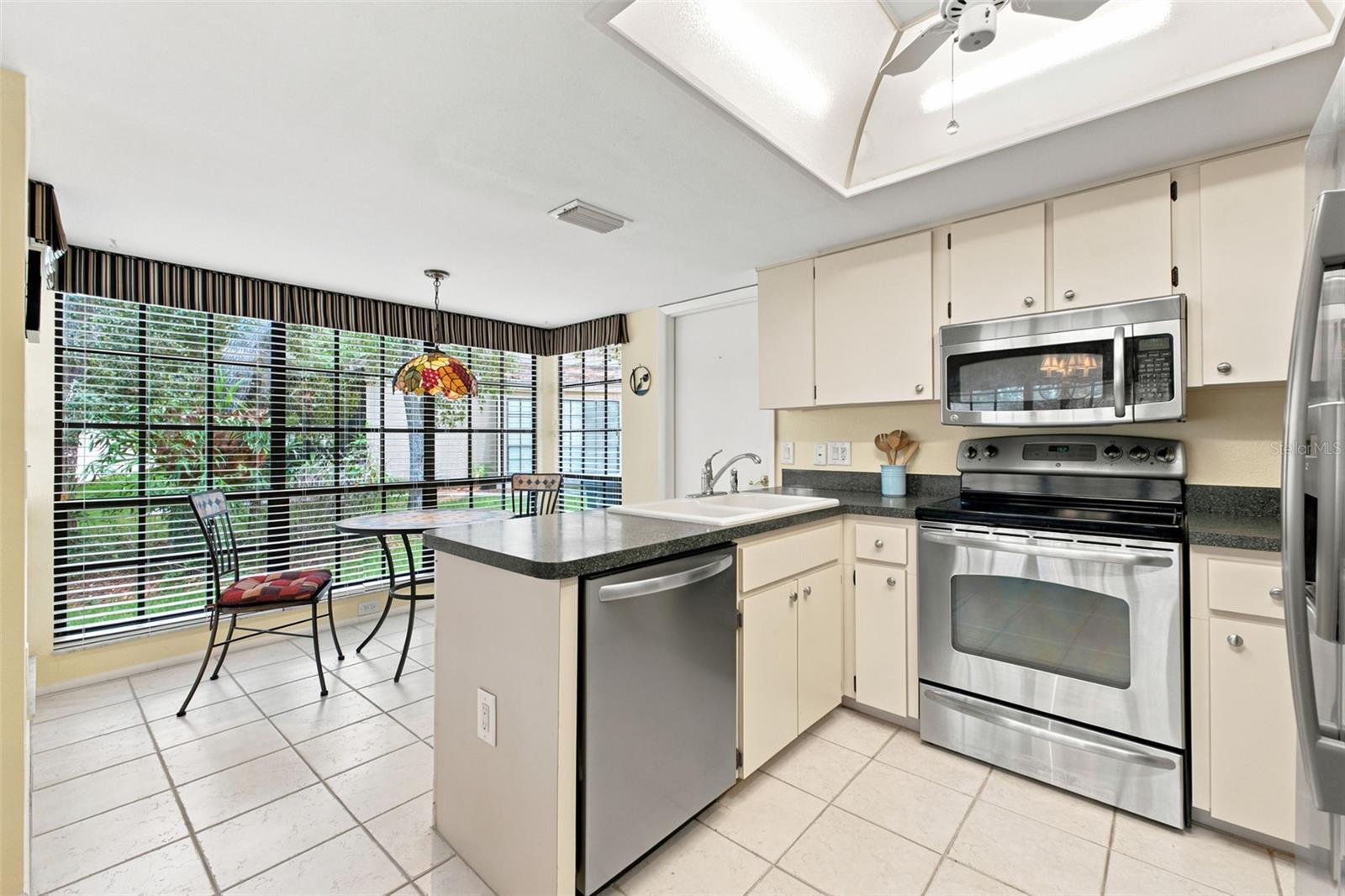 Kitchen view to breakfast nook.