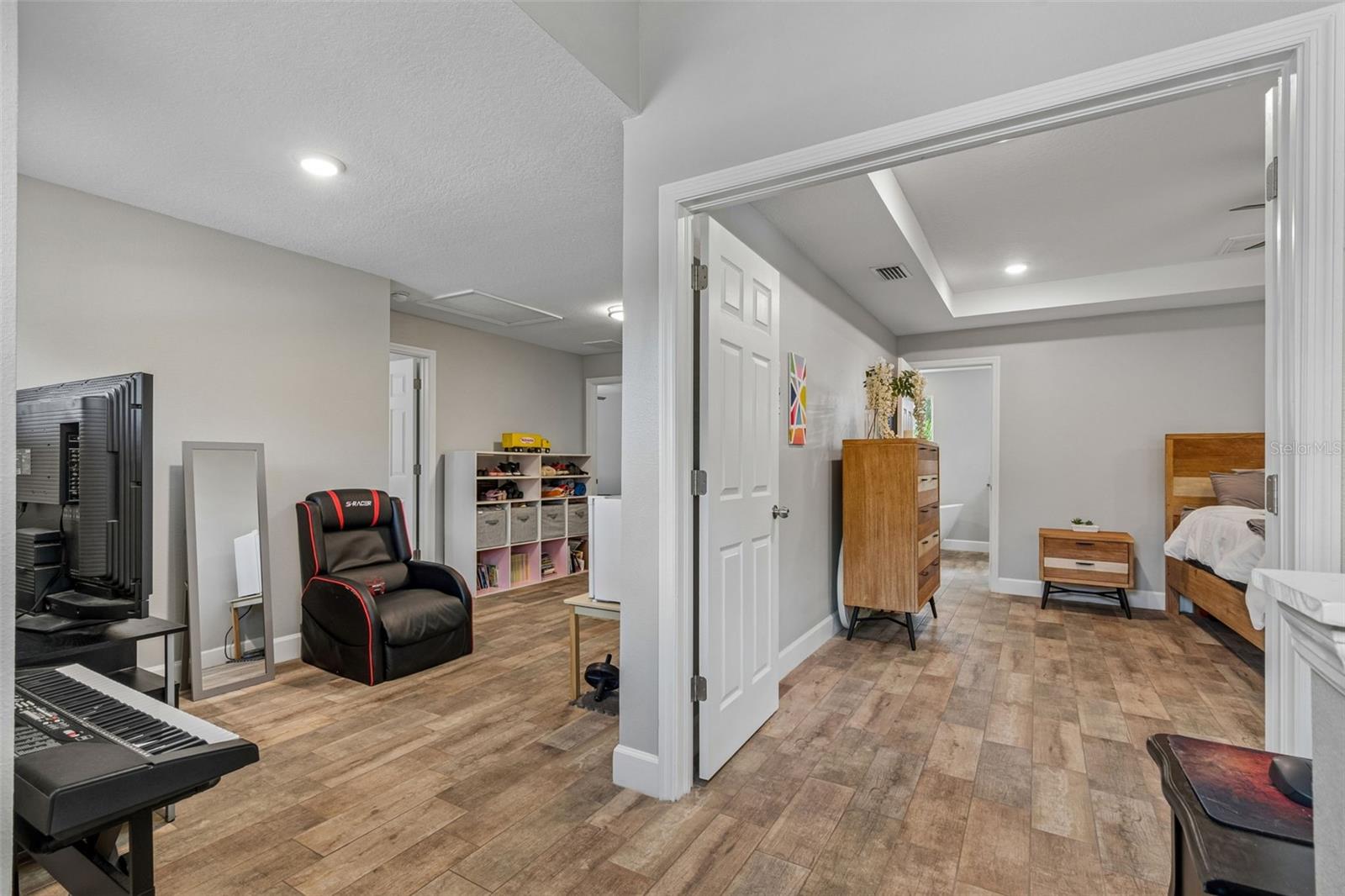 Loft and Primary bedroom entrance of top of stairs