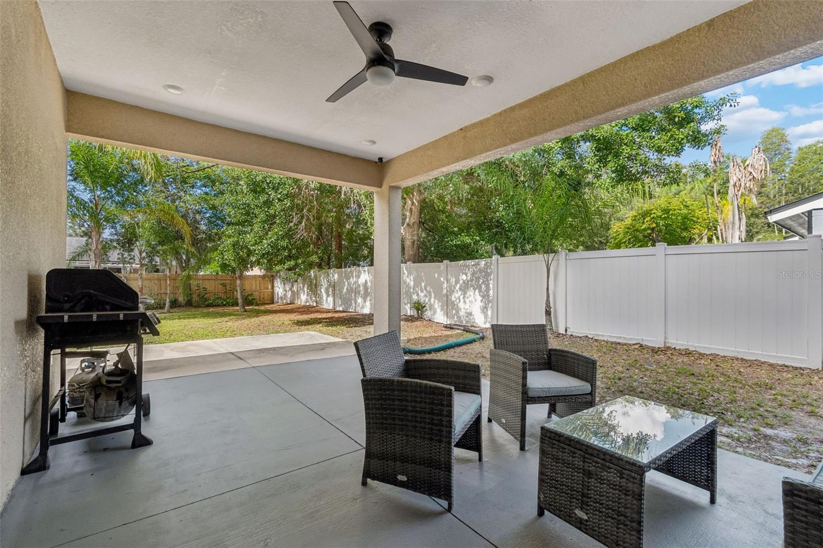 Covered patio overlooking backyard