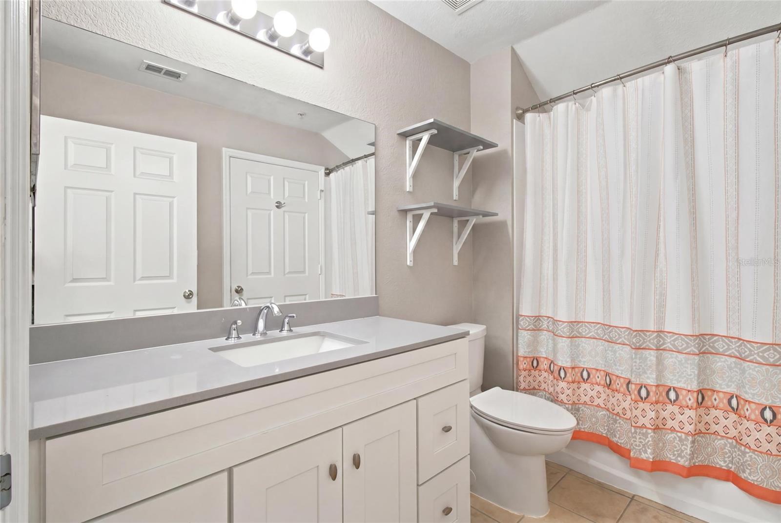 Full Bathroom. Quartz Countertop vanity and tub/shower combo
