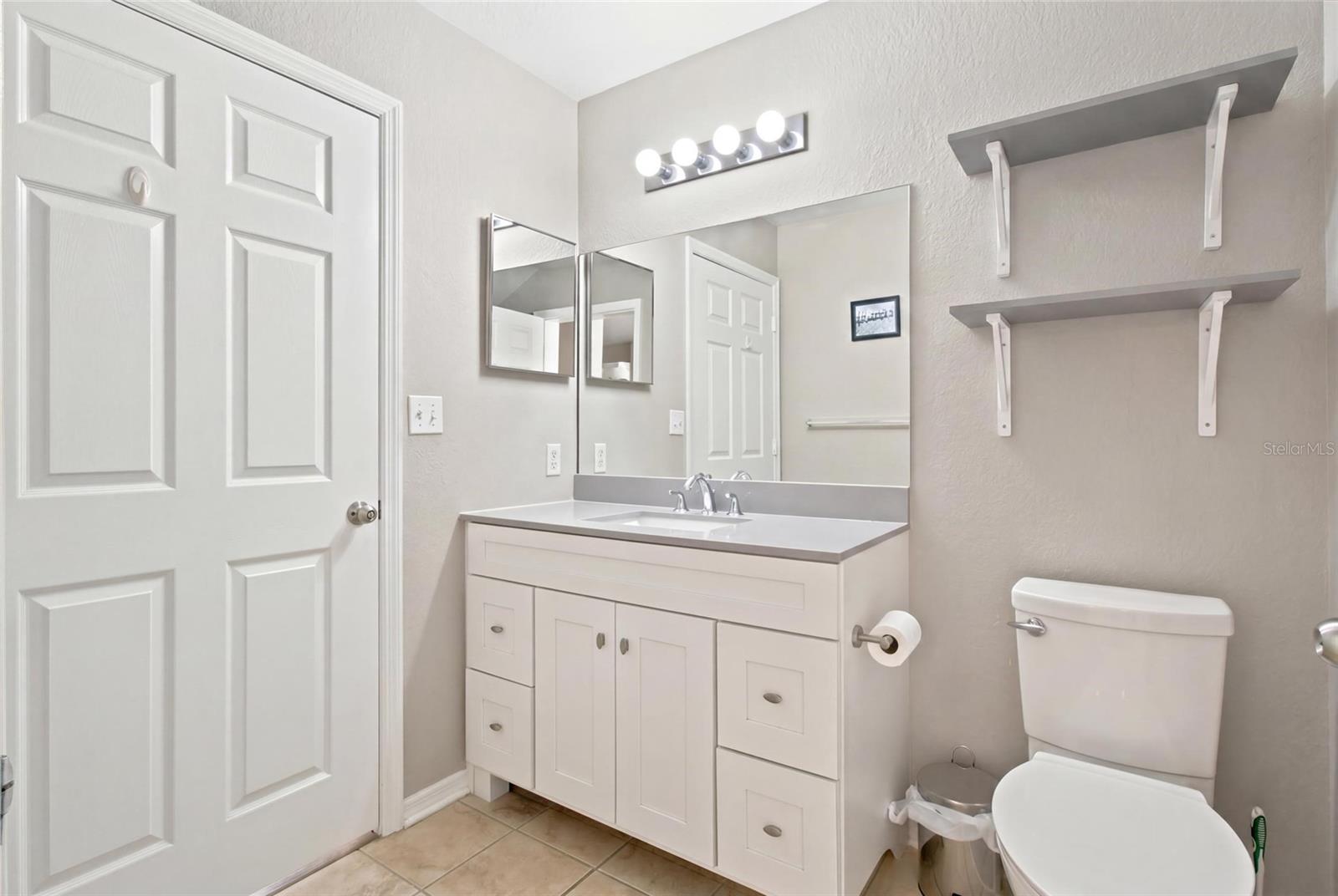 Full Bathroom. Quartz Countertop vanity and tub/shower combo