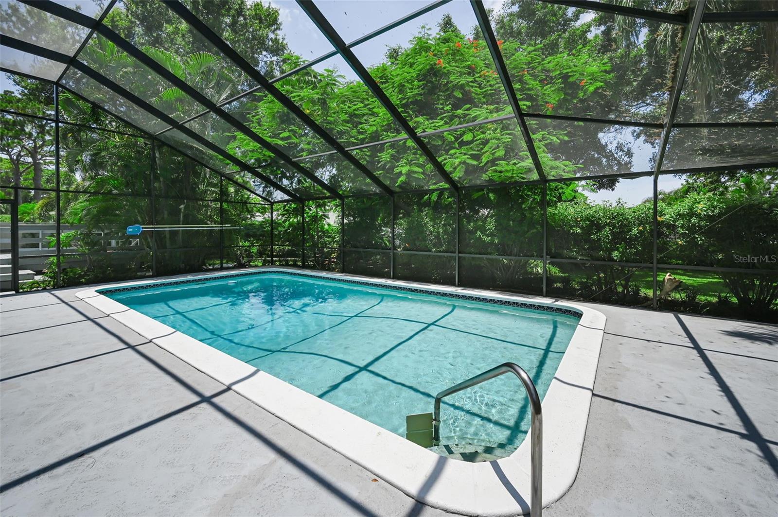 Step out of the Family Room to the Screen Enclosed Pool