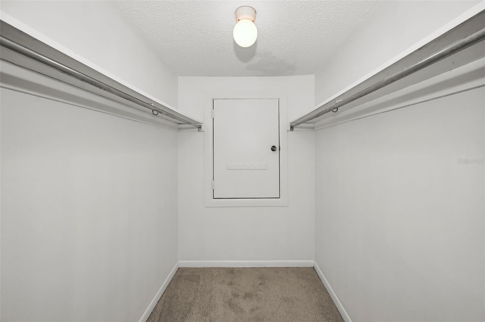 One of the two walk-in closets in the Primary Bedroom