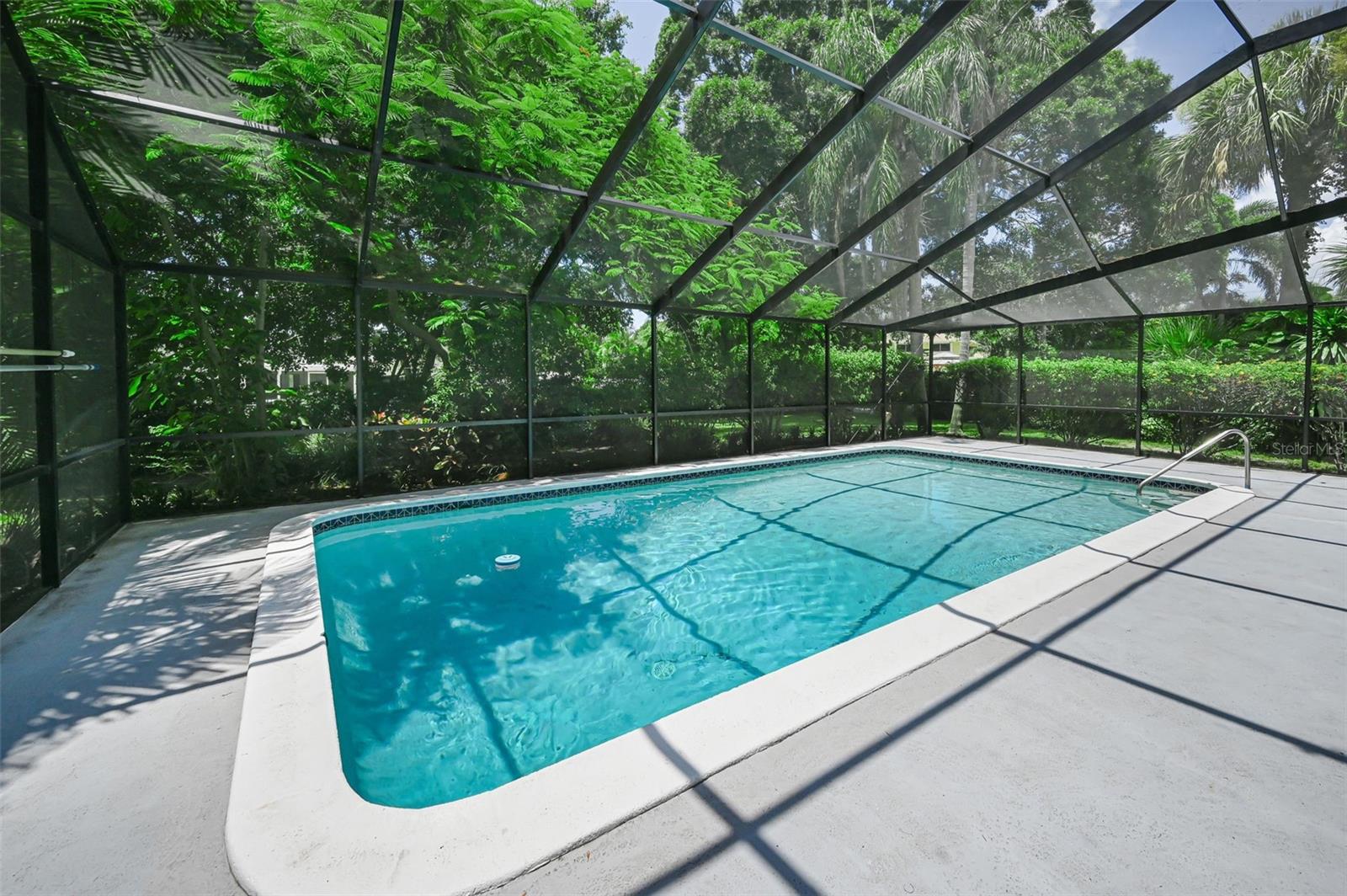 Cool off in your refreshing, screen enclosed inground pool!