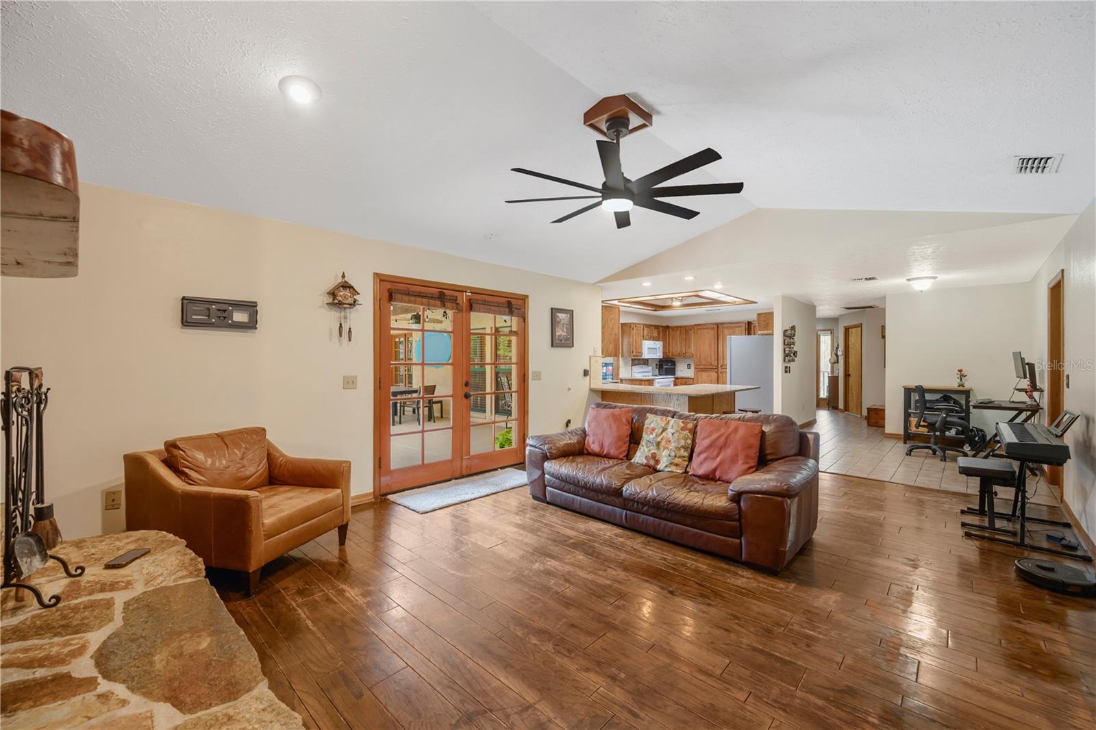 Seamless connection from family room to kitchen.