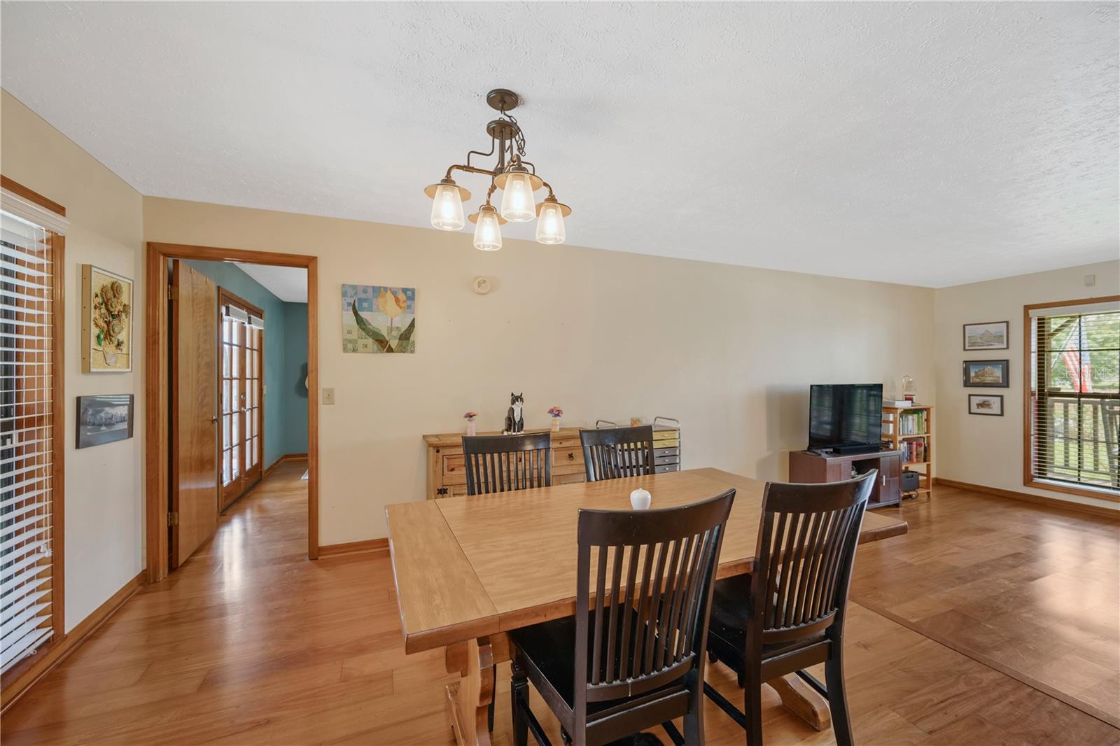The private owner's suite is next to the dining room at the front of the home while all secondary bedrooms are located towards the back of the home for privacy.