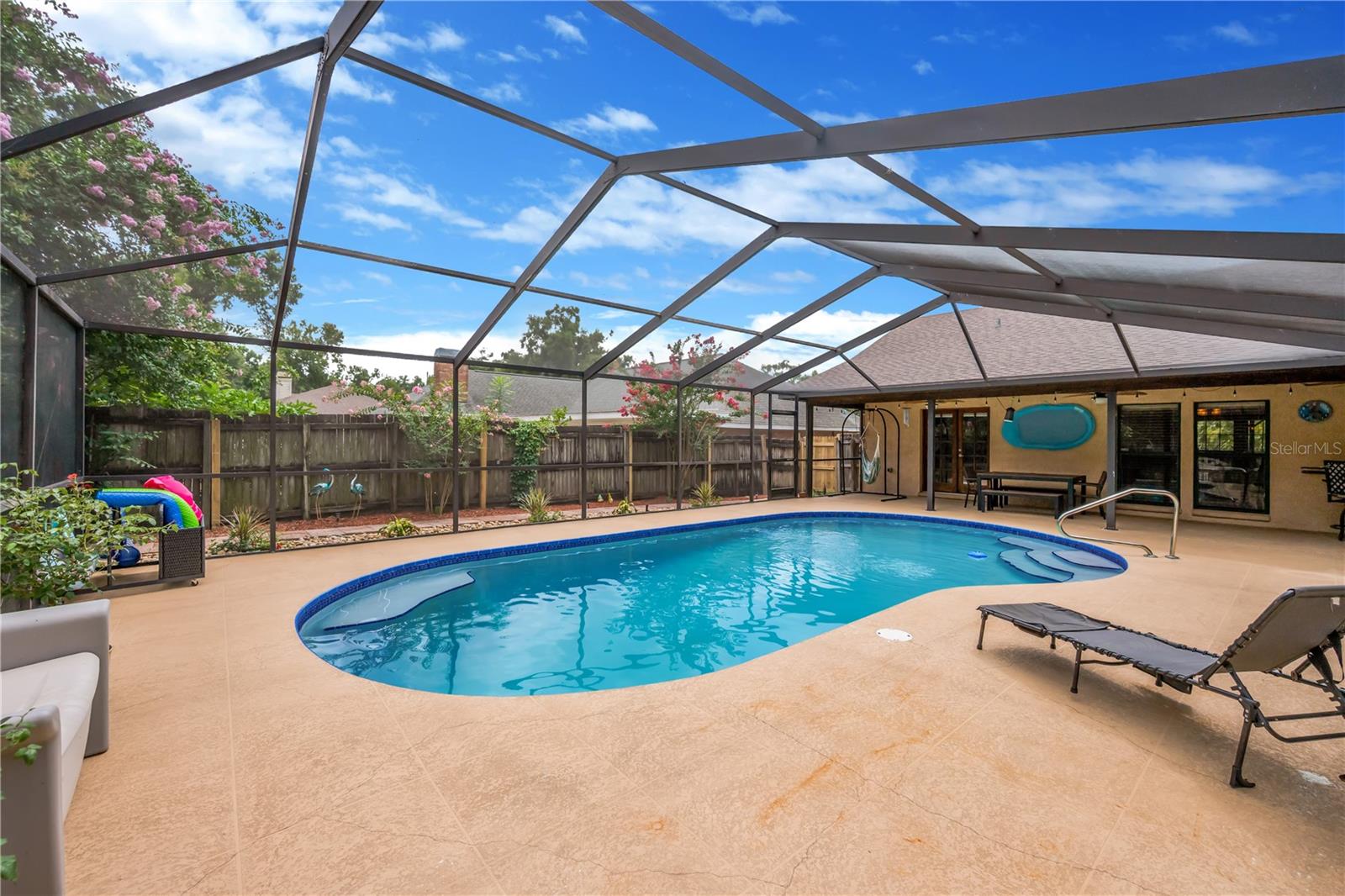 The convenient pool bath has exterior access to the pool making entertaining easy while helping keep the main living areas clean and dry.