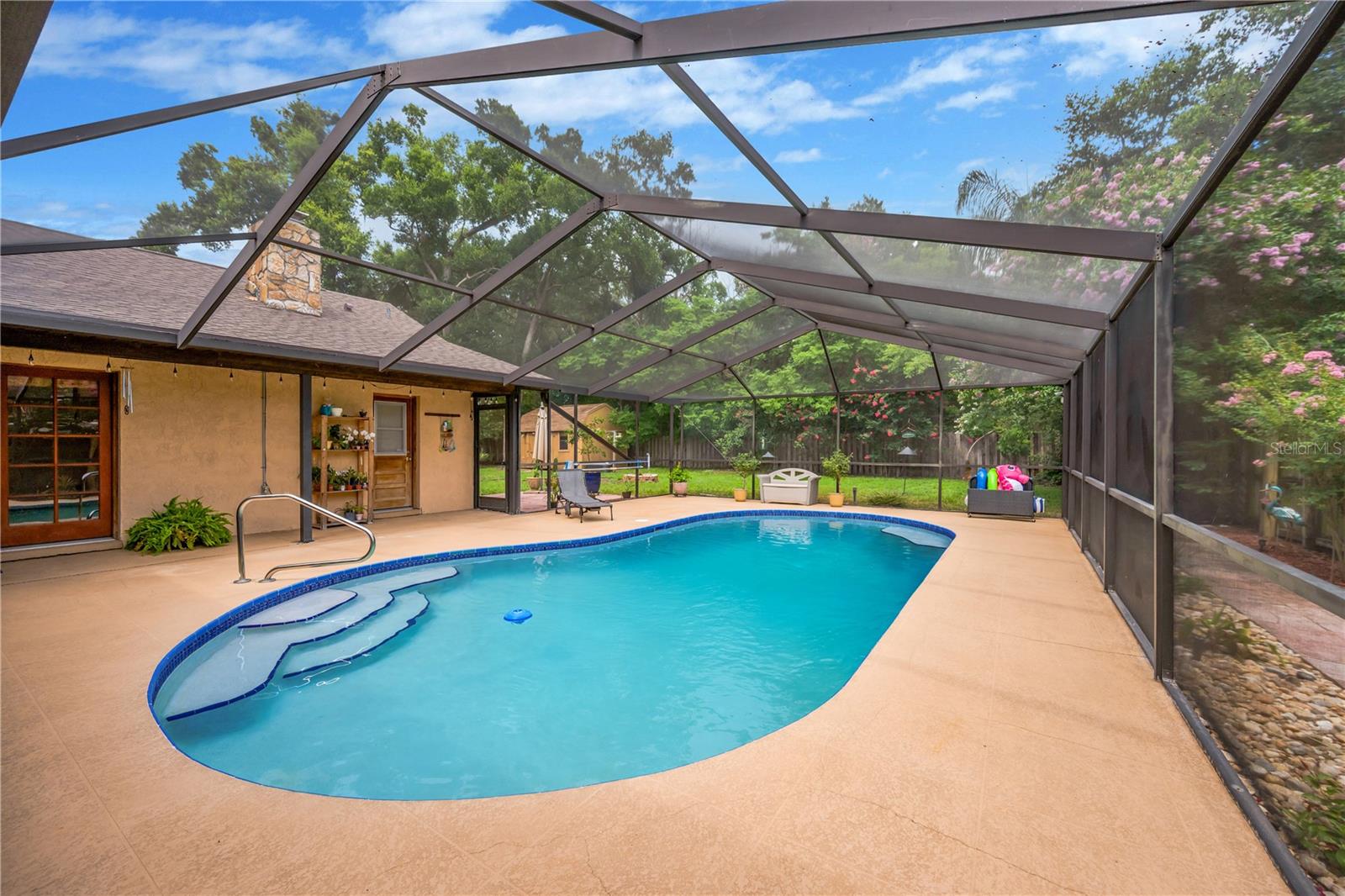 Lush landscape makes the backyard private as well.
