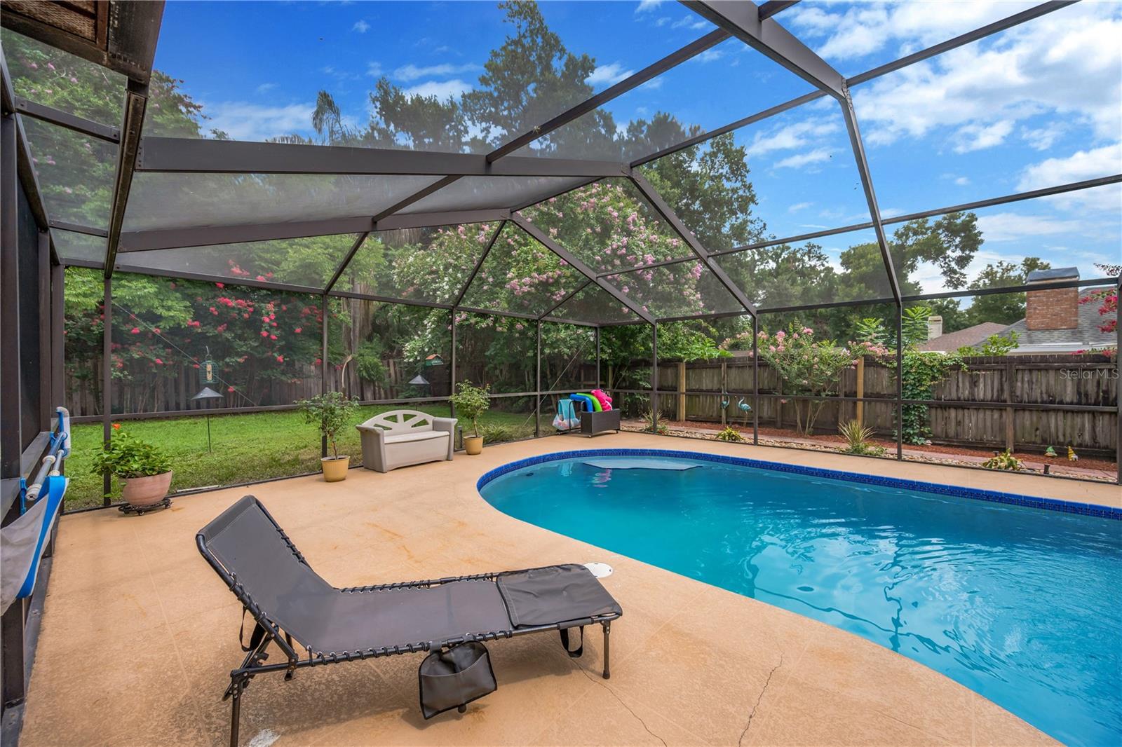 The patio around the pool has plenty of room for lounging.