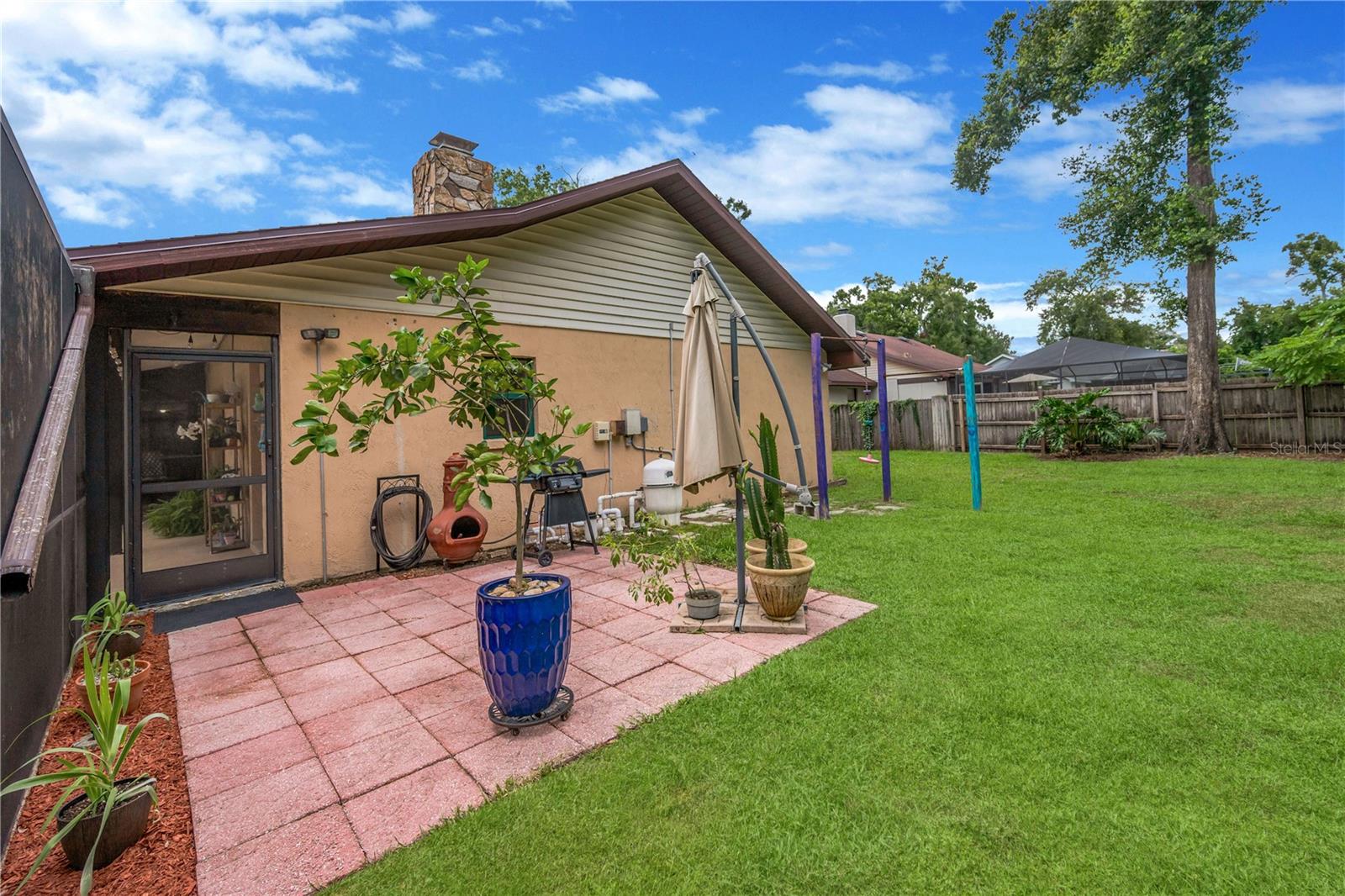 Soak up the Florida sunshine on the paver patio outside of the lanai.