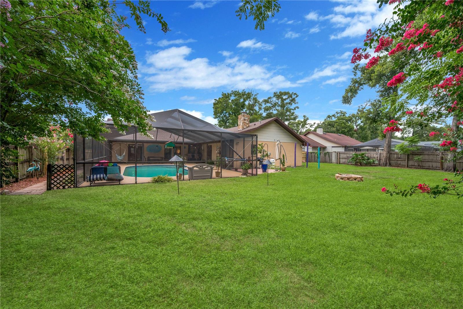 Situated on a private, fenced, .35 acre lot, the backyard offers plenty of room to play, garden, or simply unwind.