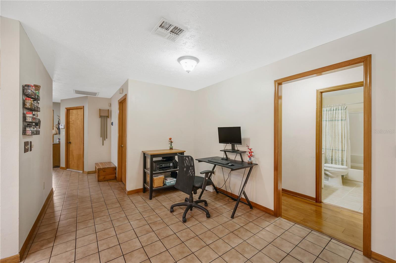 Room for a casual dinette table next to kitchen.
