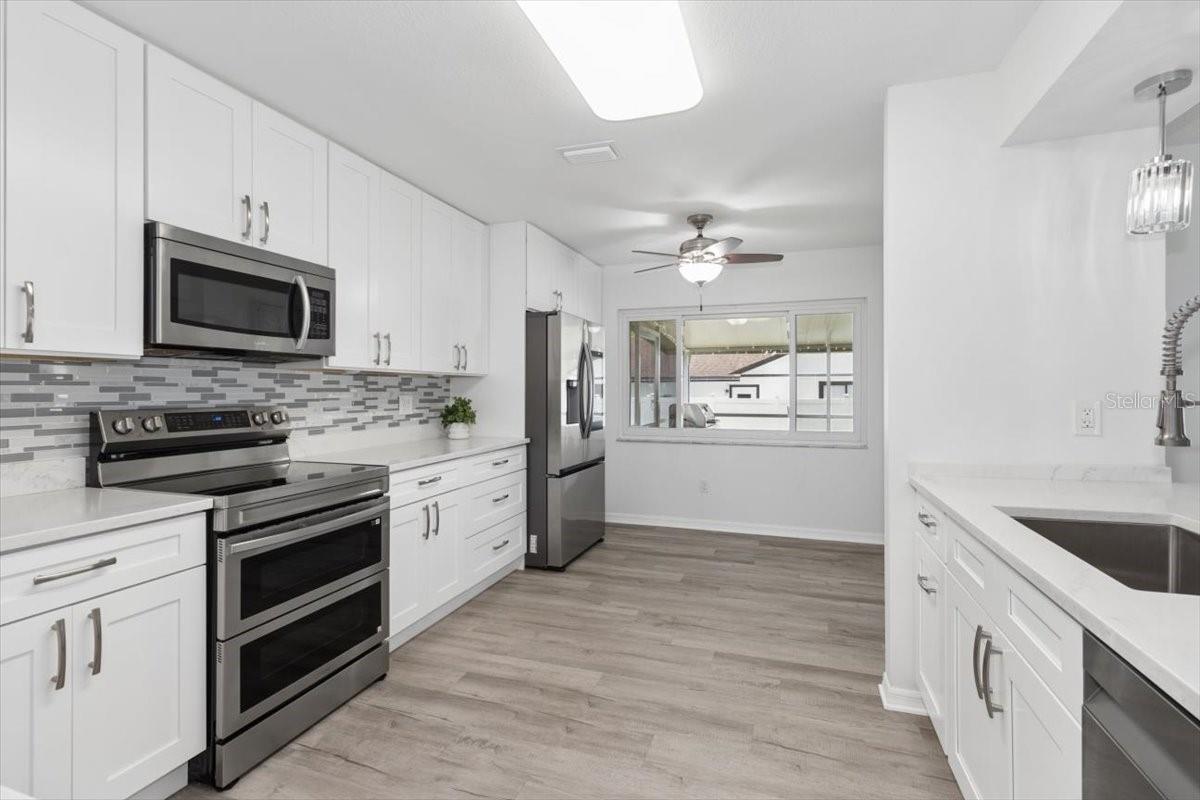 Designed with today's lifestyle in mind, the fully remodeled kitchen features modern finishes, ample storage, and an inviting space for gathering with family and friends.