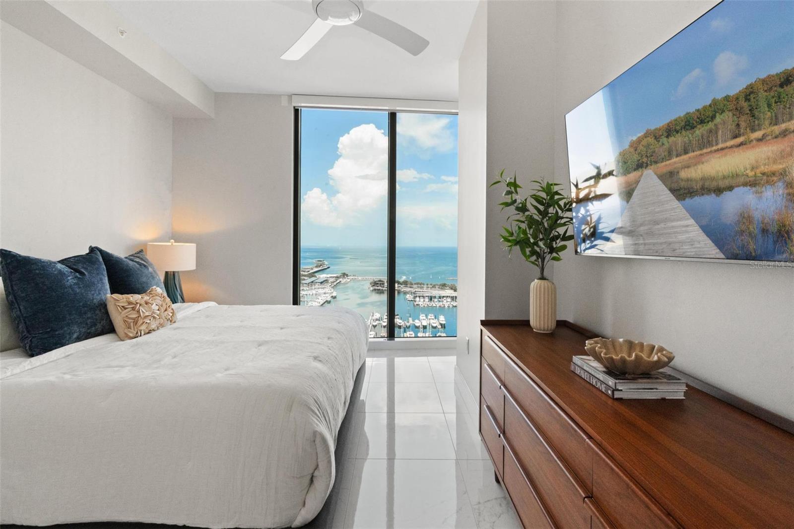 Master Bedroom has beautiful water views, walk-in closet, and luxurious en-suite bathroom!