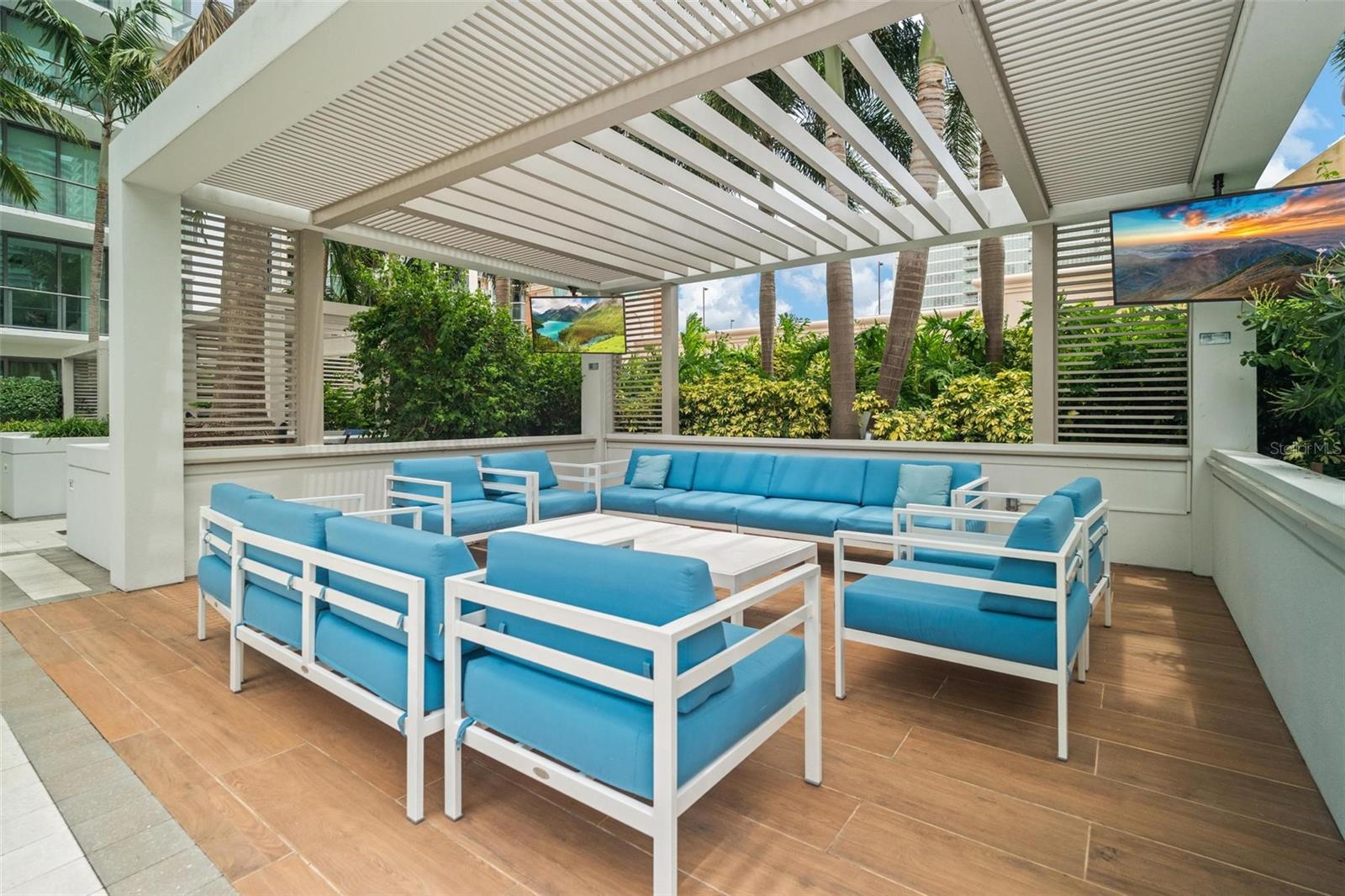 Numerous cabanas designed to provide shade and privacy