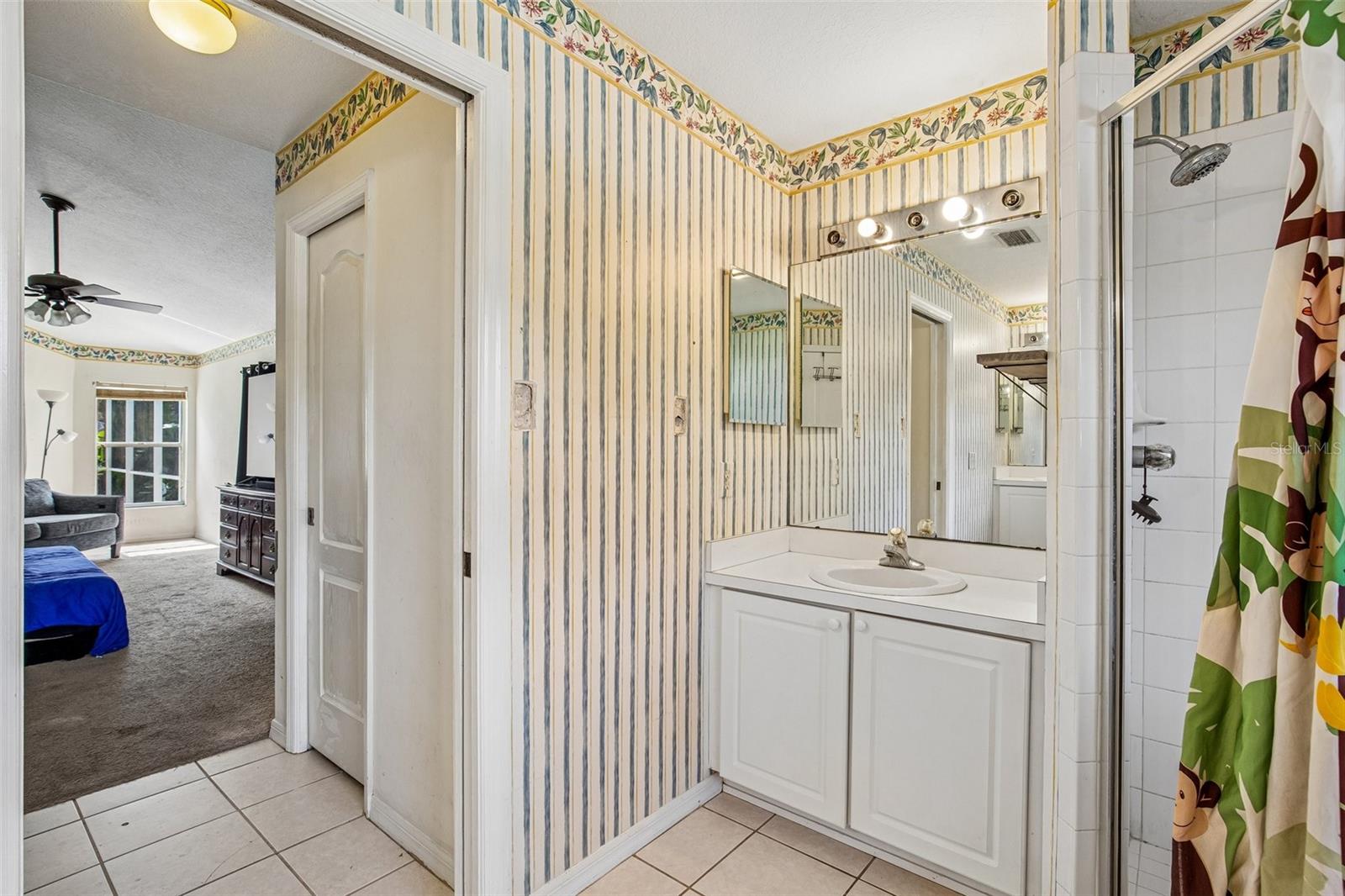 PRIMARY BATHROOM OFFERS DUAL VANITY SINKS