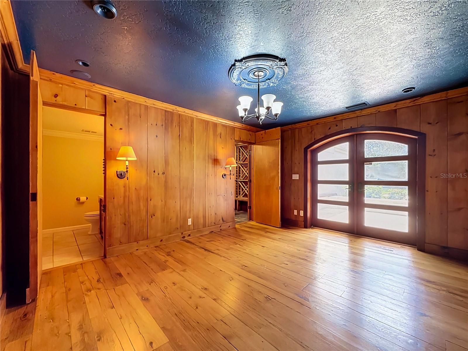 Office/Den - Half Bath - Wine Room - Front Patio