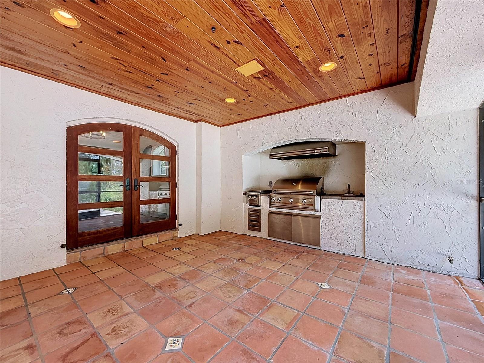 Screened Lanai - Outdoor Kitchen - Pool, and Outdoor Living Space