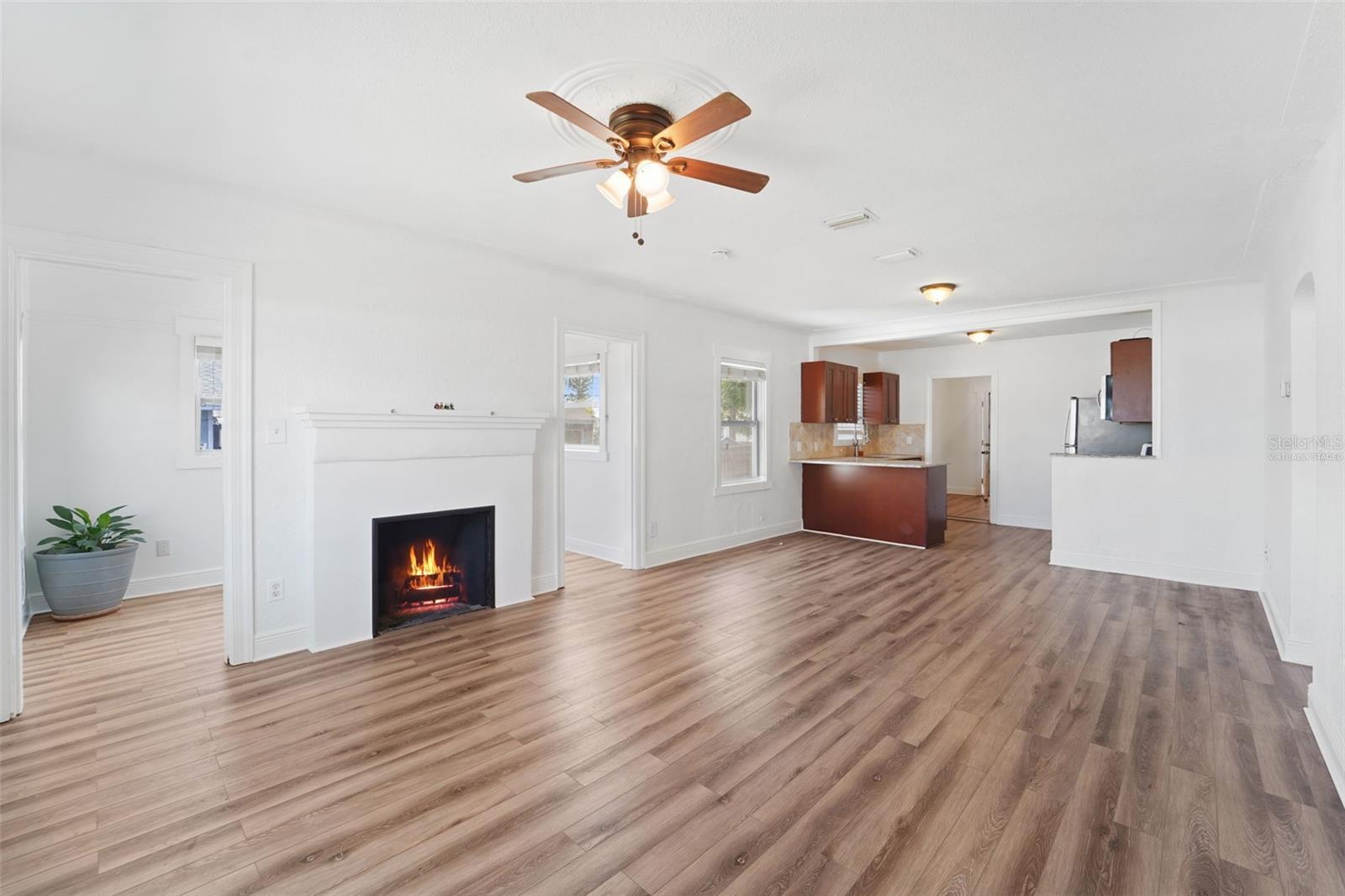 Fireplace is not functional - only decorative. Virtually Staged fire.
