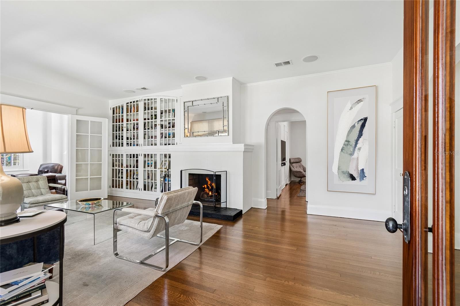Walk in to the family room with antique bookcases