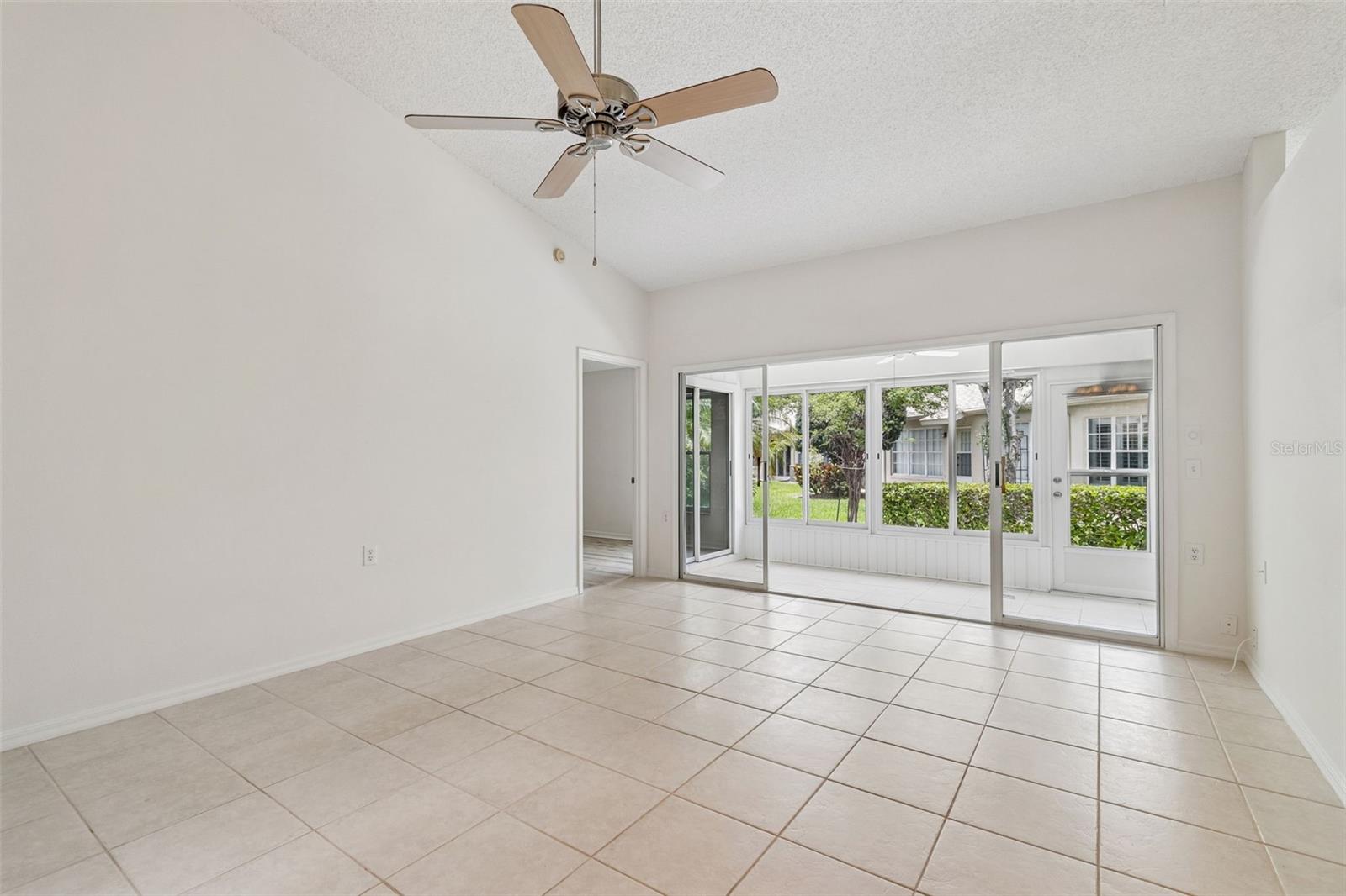 Great Room towards Sun Room & door to Primary Bedroom