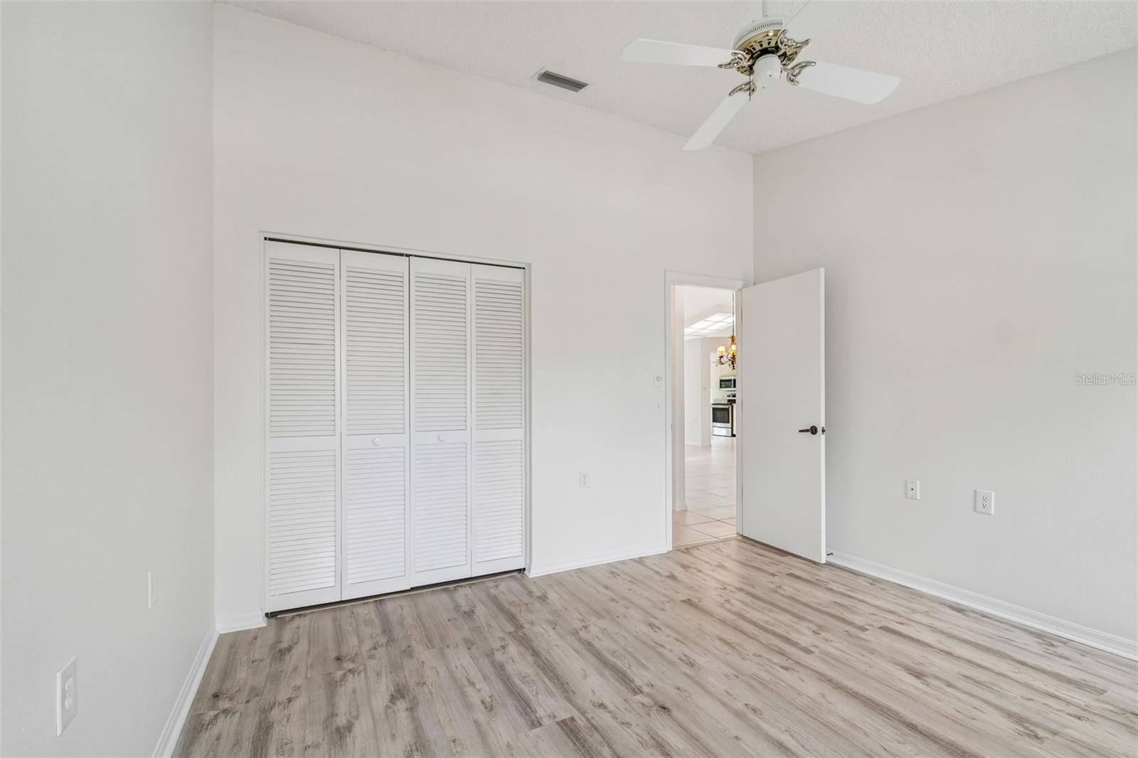 Bedroom 2 w/ vaulted ceiling