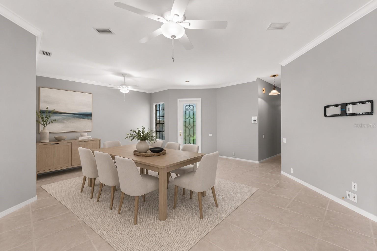 Dedicated dining area perfect for family gatherings while enjoying peaceful conservation views through the surrounding windows.