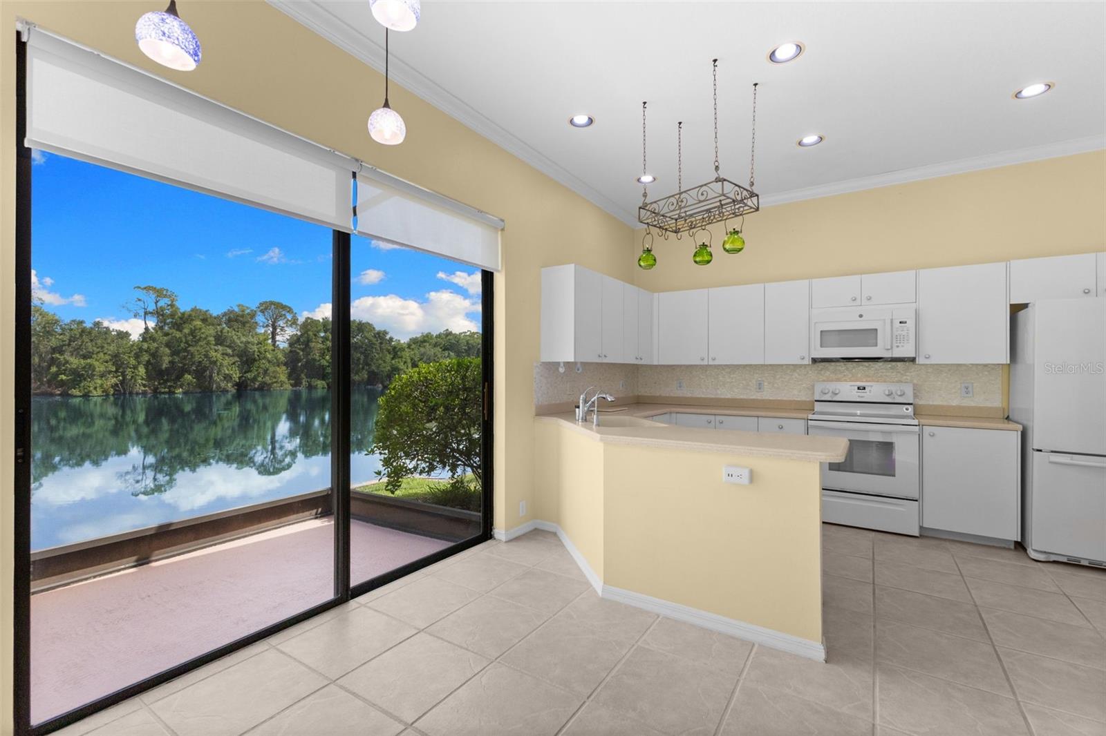 Enjoy morning coffee with tranquil water and conservation views from the sunny breakfast nook.