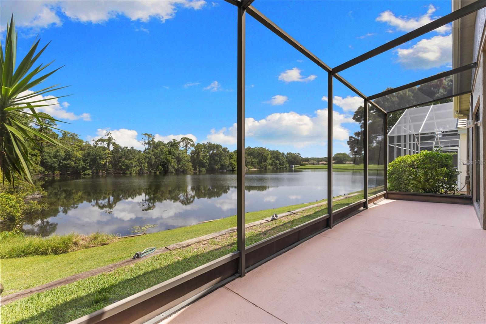 Relax on the screened lanai while enjoying one of Parkside's most private water and conservation settings.