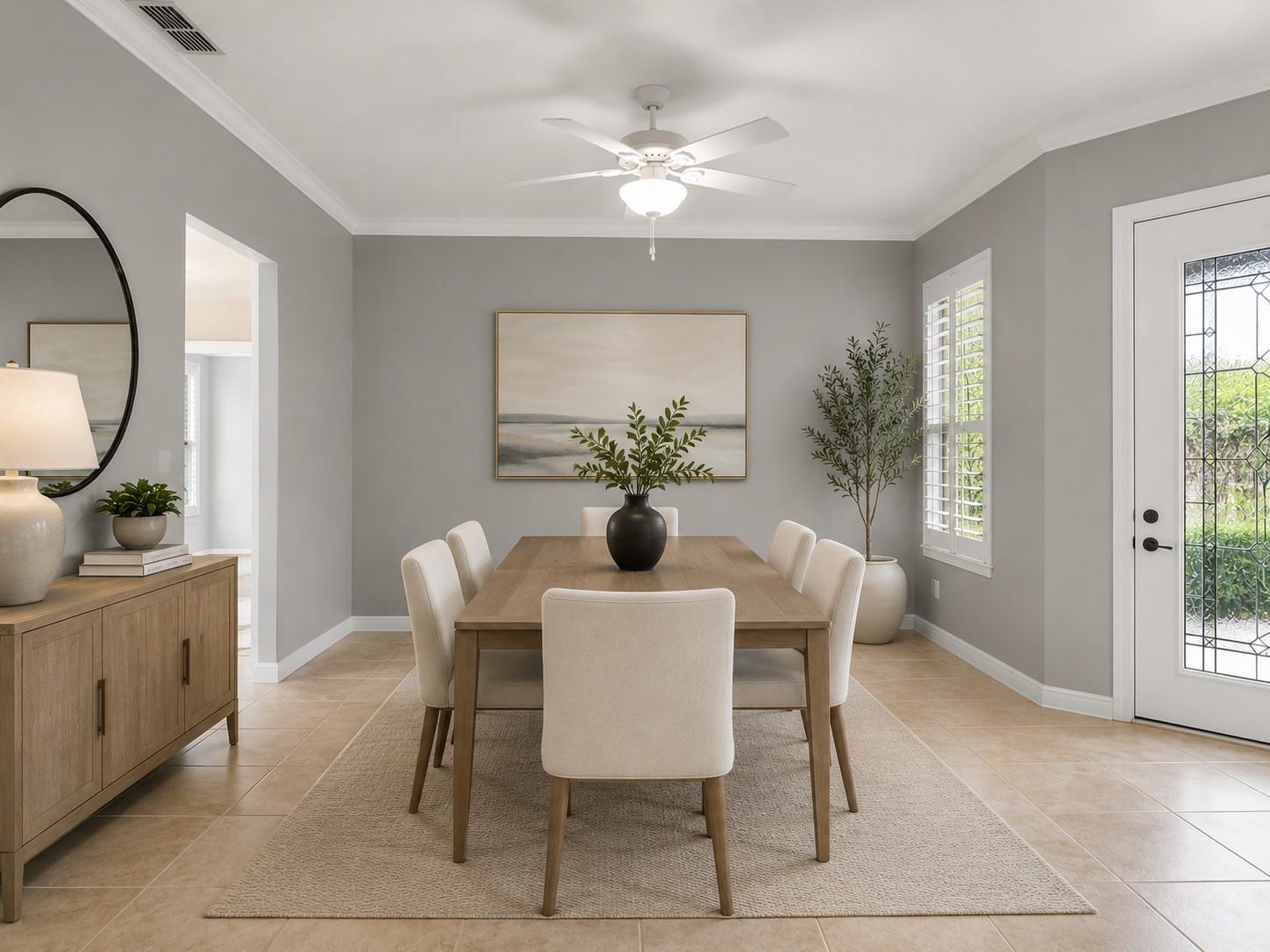 Virtual Staged Dedicated dining area perfect for family gatherings while enjoying peaceful conservation views through the surrounding windows.