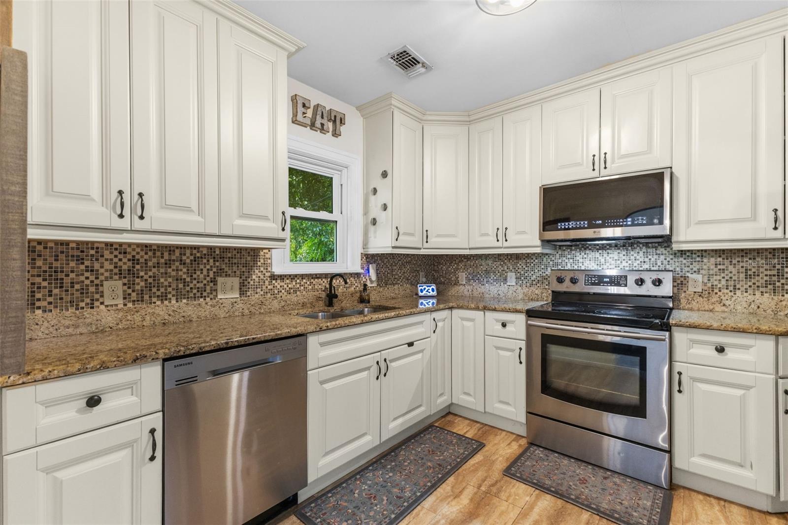 Functional kitchen with stainless appliances