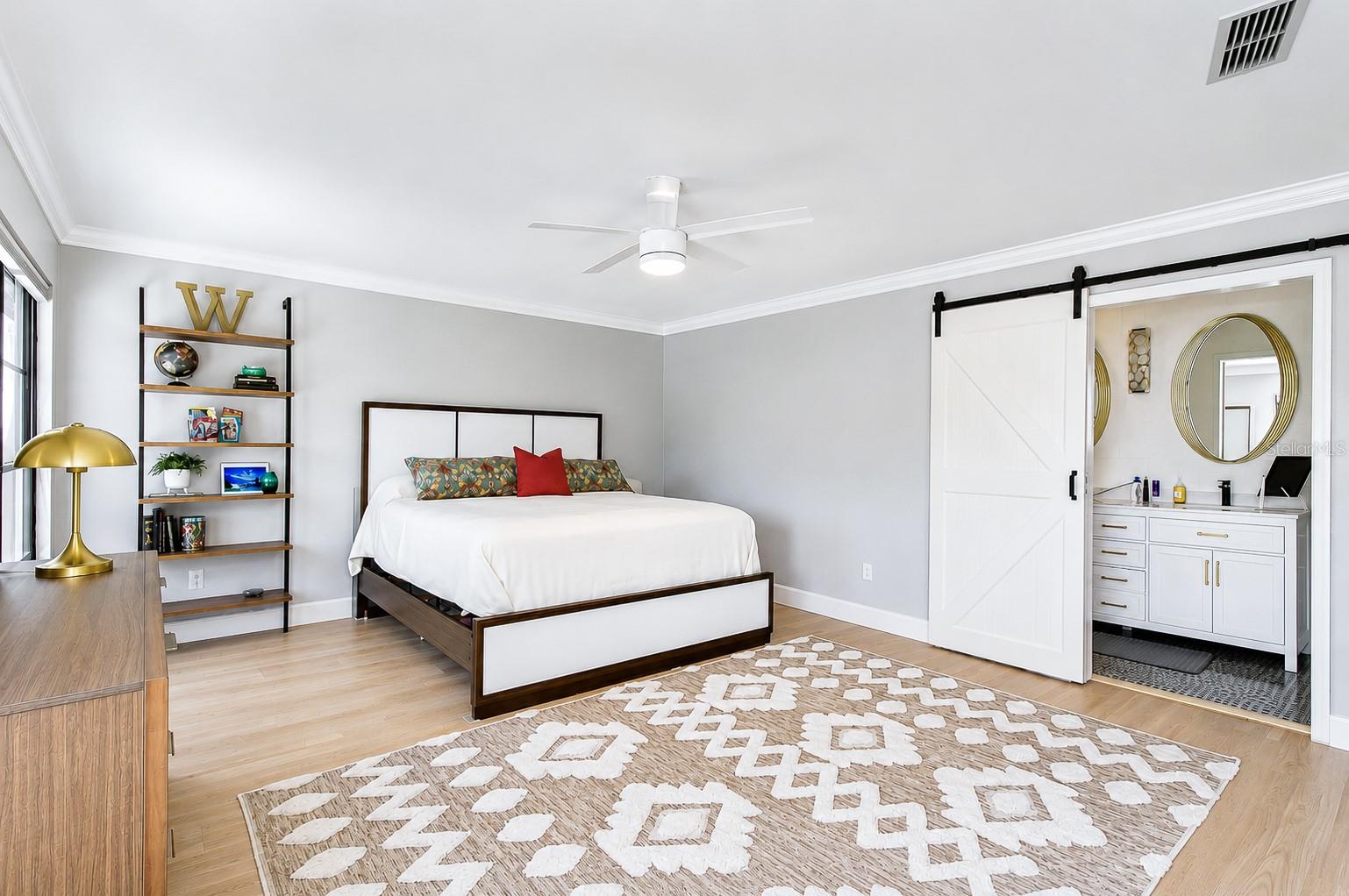 Oversized windows filling the room with natural light.