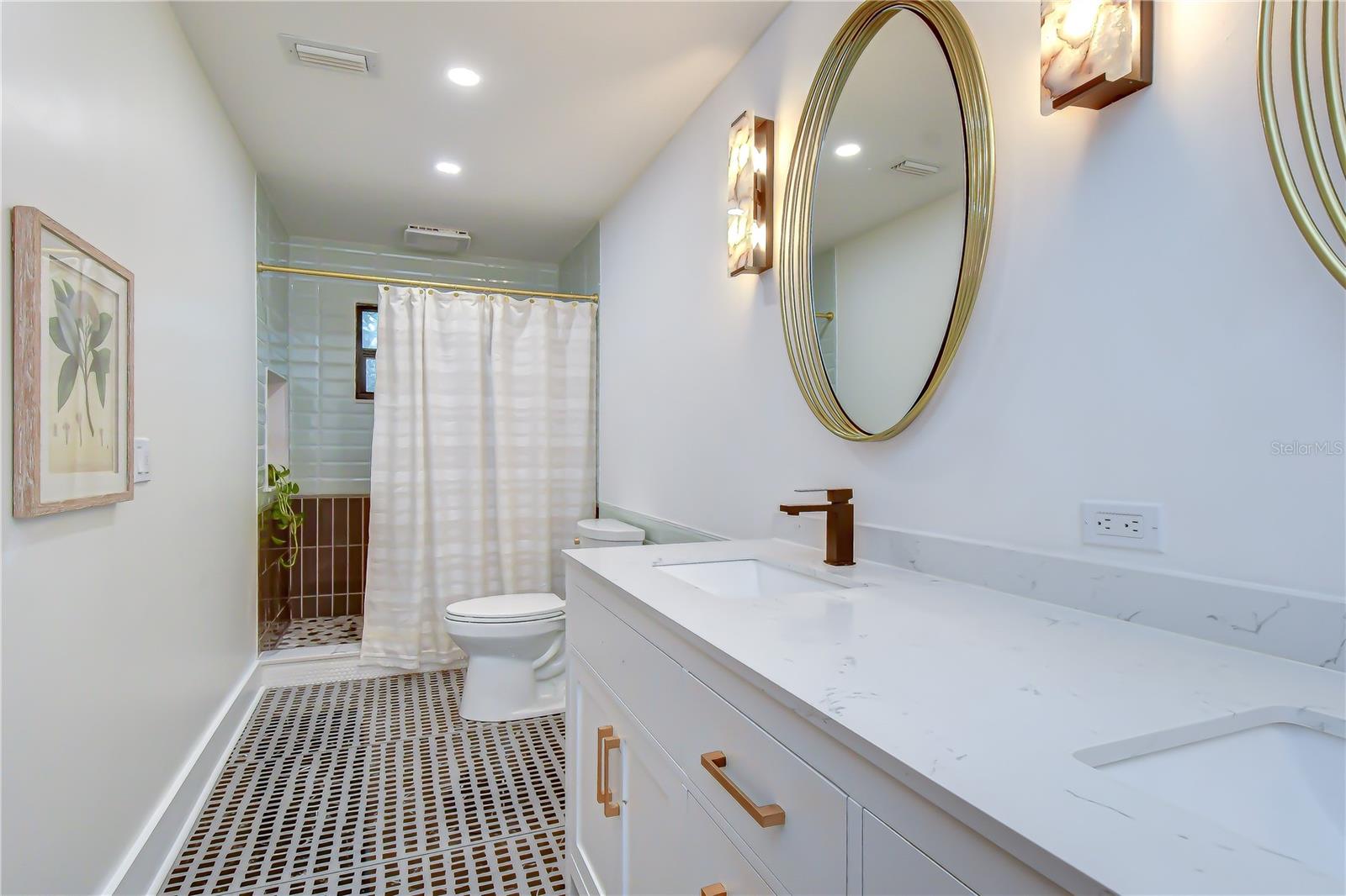 Spa-inspired en-suite with designer finishes.