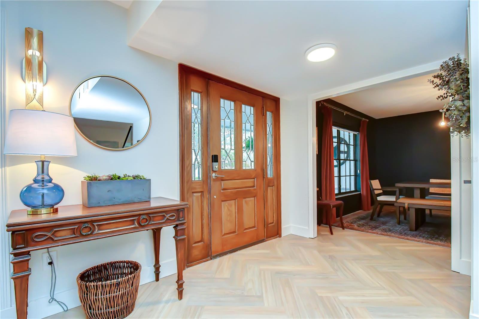 Welcoming entrance with immediate views of the pool and backyard.