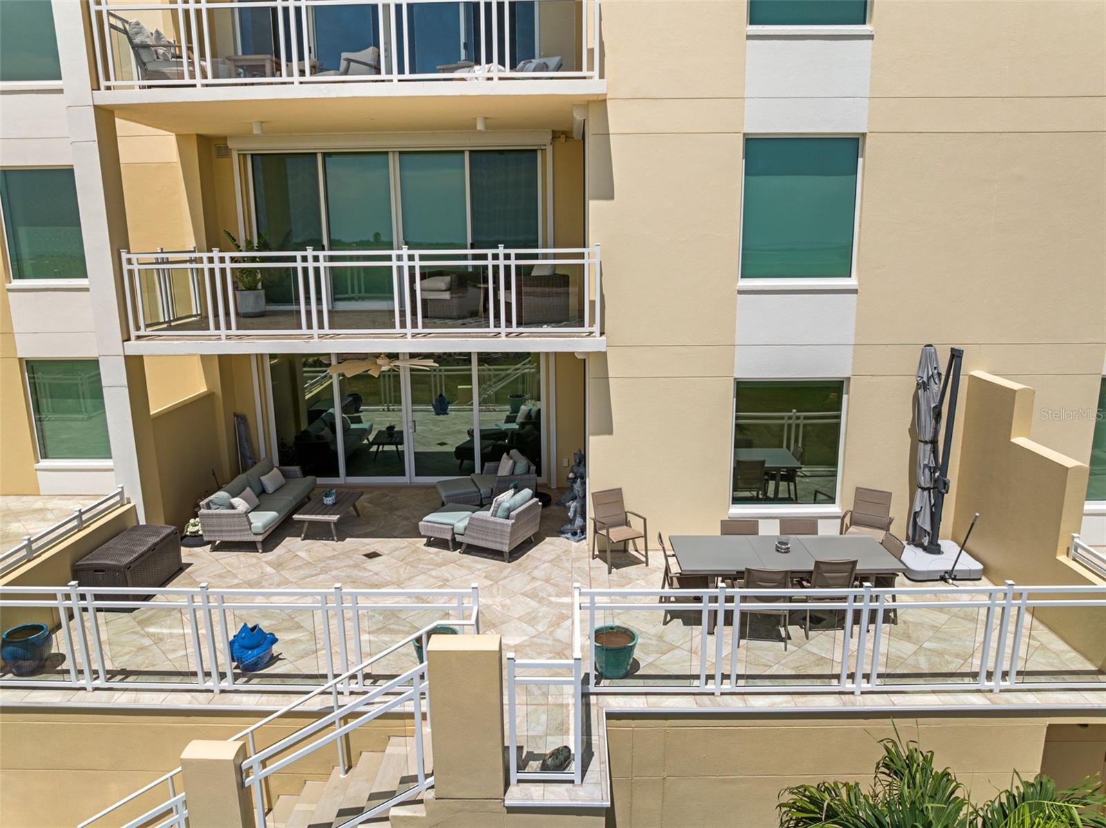 Private balcony and stairs to beach and amenities