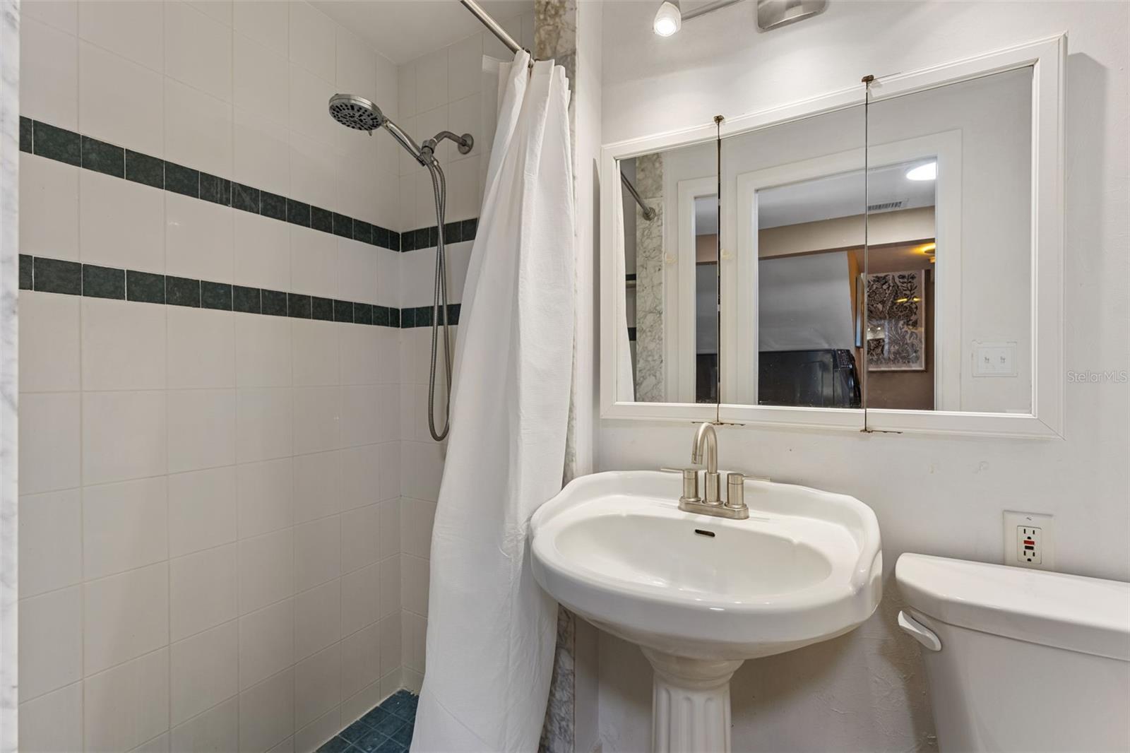 Bath near laundry and bedroom 2