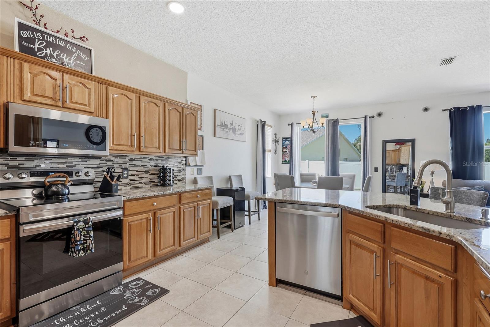 Open Kitchen to Prep a Meal while Visiting with Friends and Family