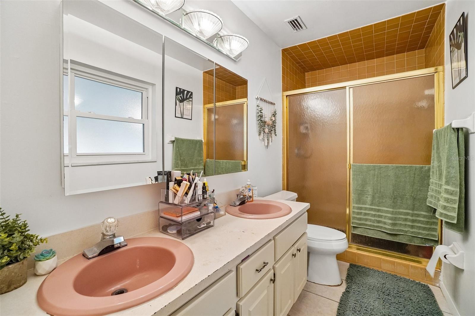 Dual Sinks & 3 Mirrored Storage Doors