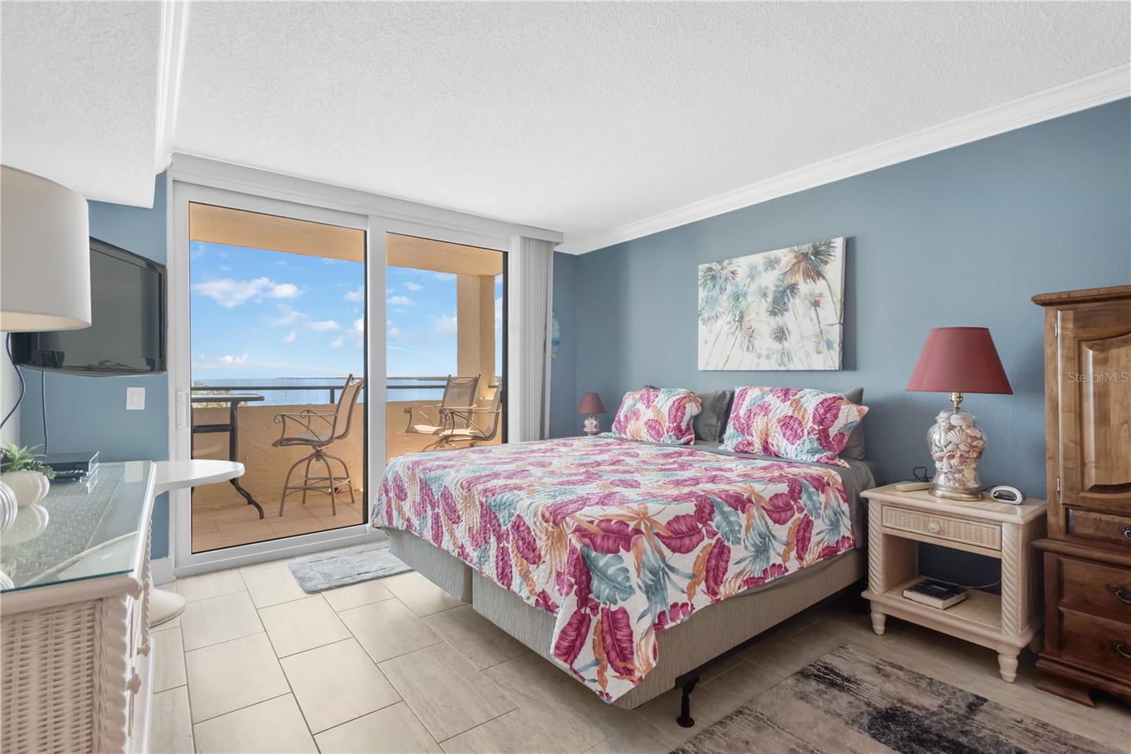 Another view of this lovely Master Bedroom with vibrant, exciting appointments.