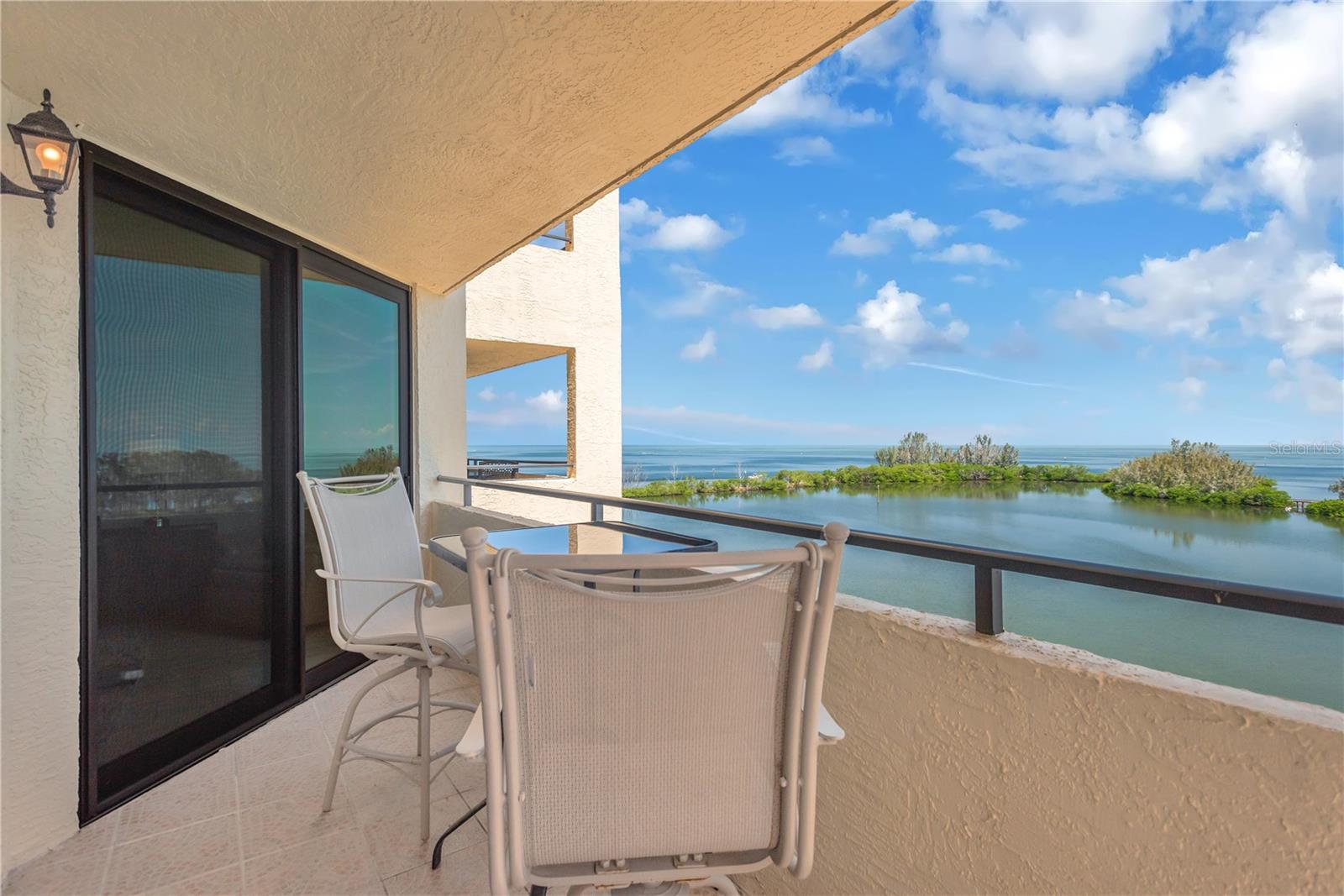 Enjoy perfect Lagoon and Gulf of America views from your private covered balcony and enjoy the spectacular watercolor sunsets at end of day.