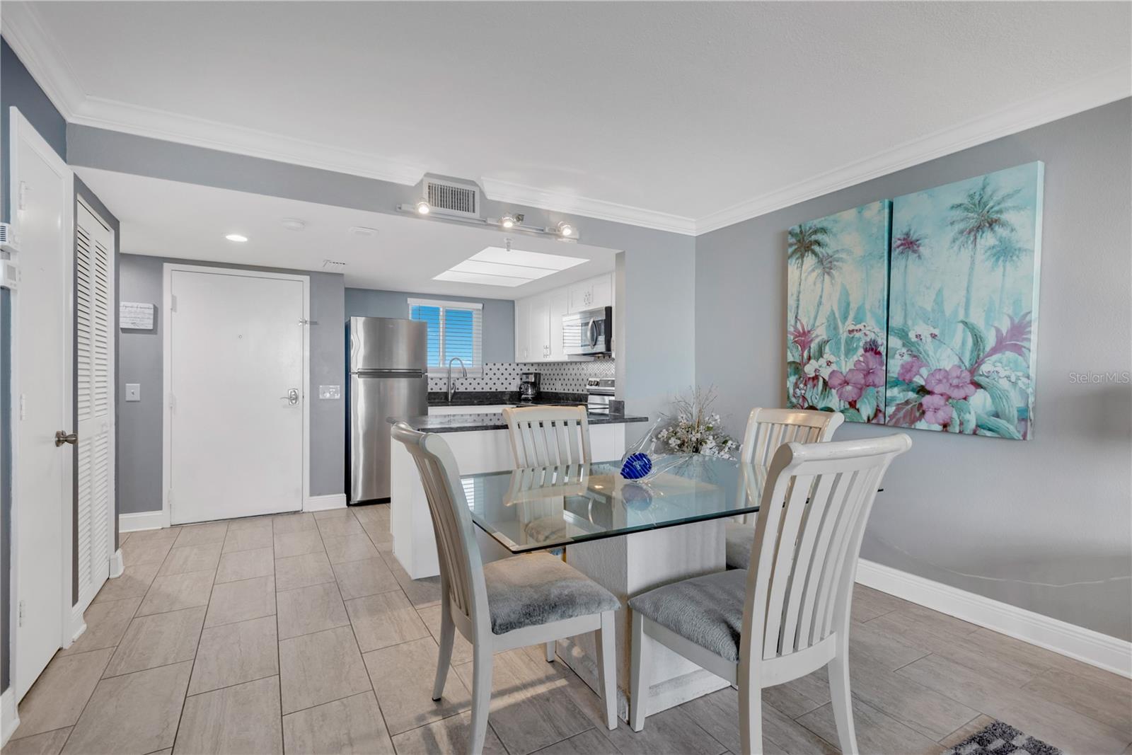 Separate dining area can accomodate a number of guests with ease.
