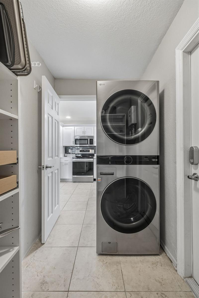 Indoor Laundry with full size Stackable Washer & Dryer