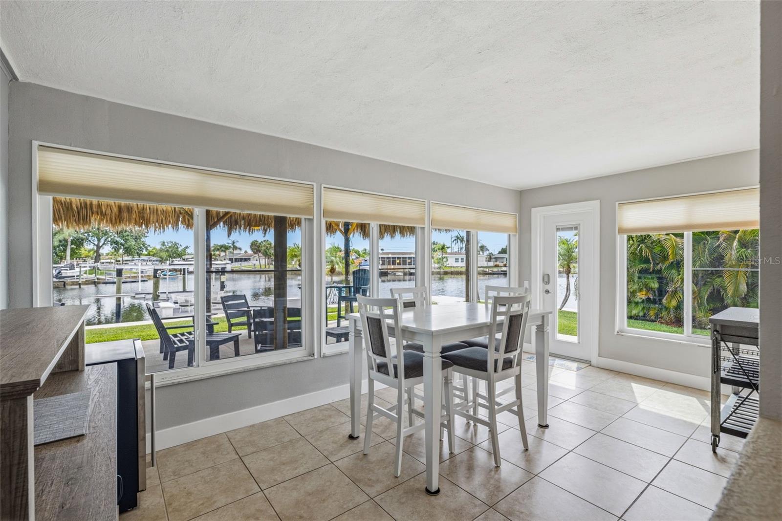 Bonus Area! Perfect for an additional lounging area or dining area overlooking the backyard! Featuring Hurricane rated, impact/resistant windows and doors!