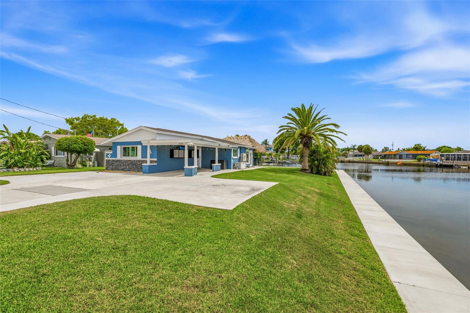 Corner property with nearly a 1/4 of acre and 200 feet of water frontage!