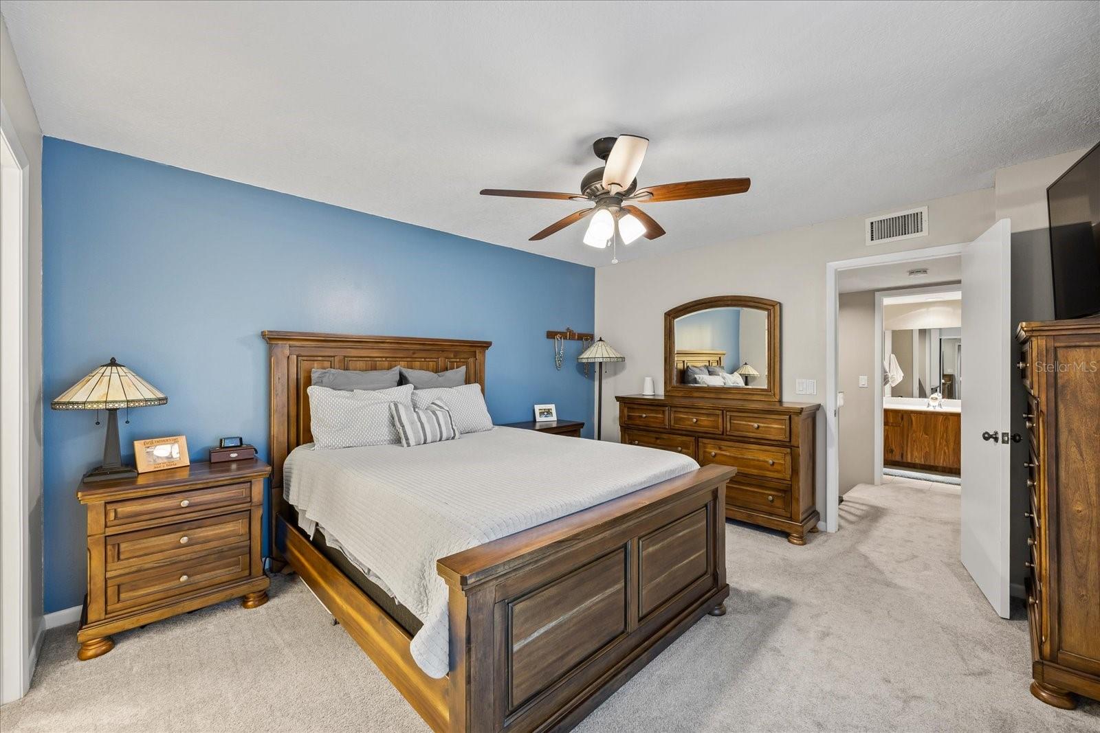 The generously sized primary suite allows room for all furnishings and storage for more!